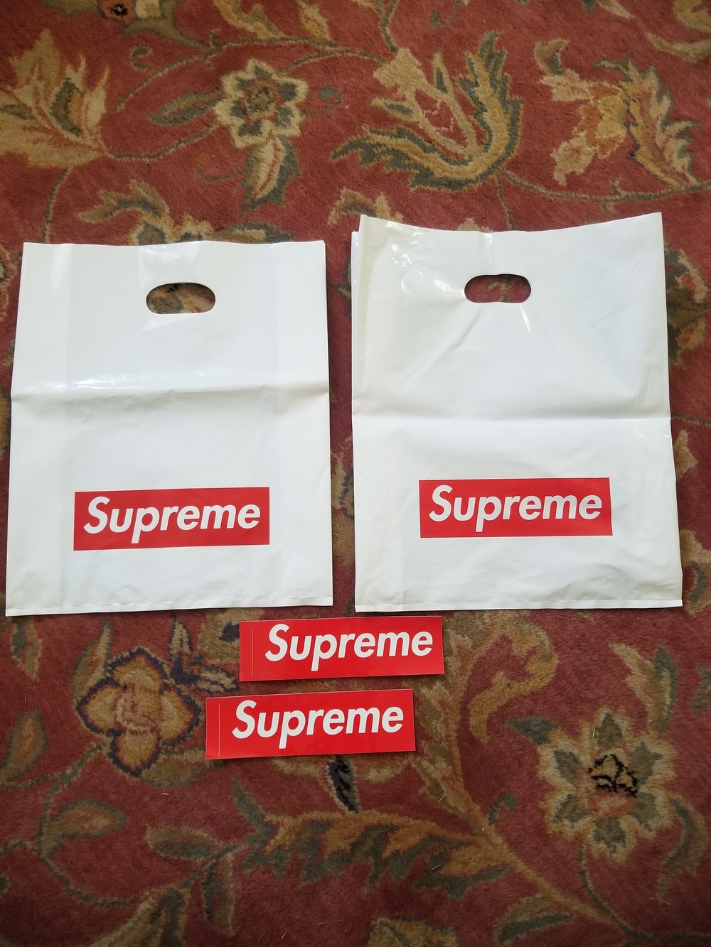 Supreme White Bags with Red Logo and Matching Stickers